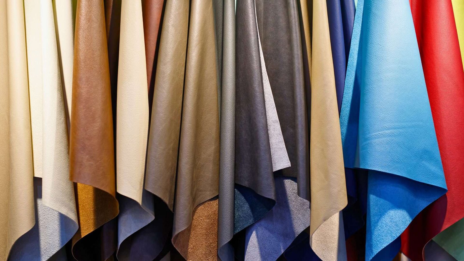 Colorful leather swatches hanging in a row